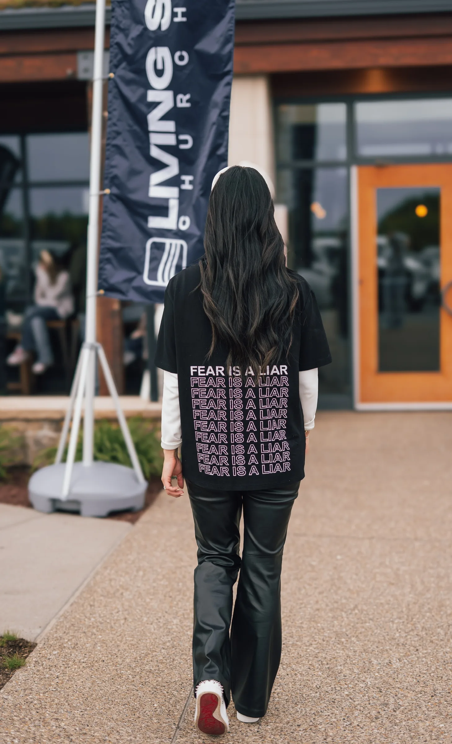 A guest walking toward the Living Springs Church entrance