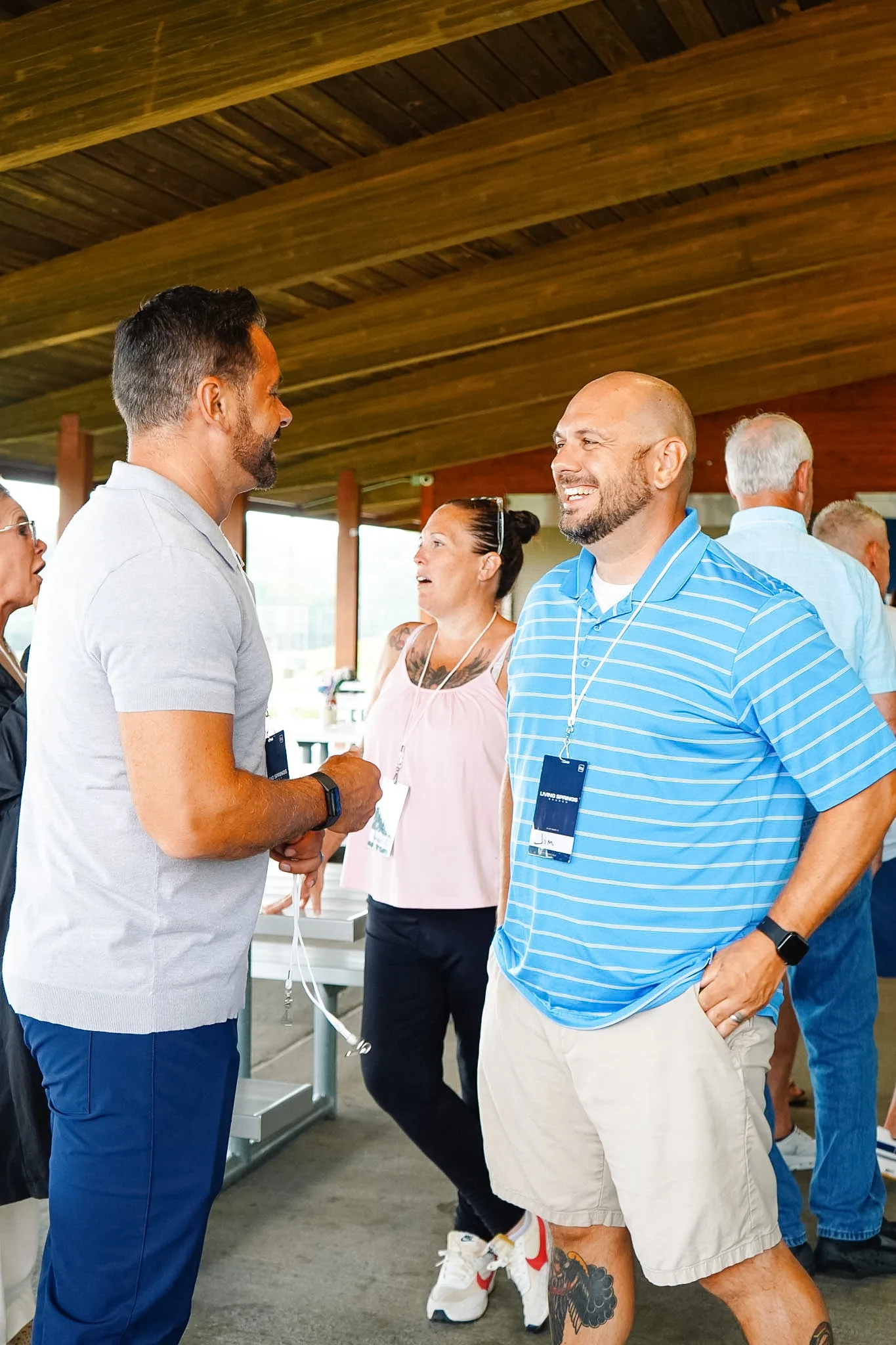 Neighbors laughing together at a Living Springs gathering