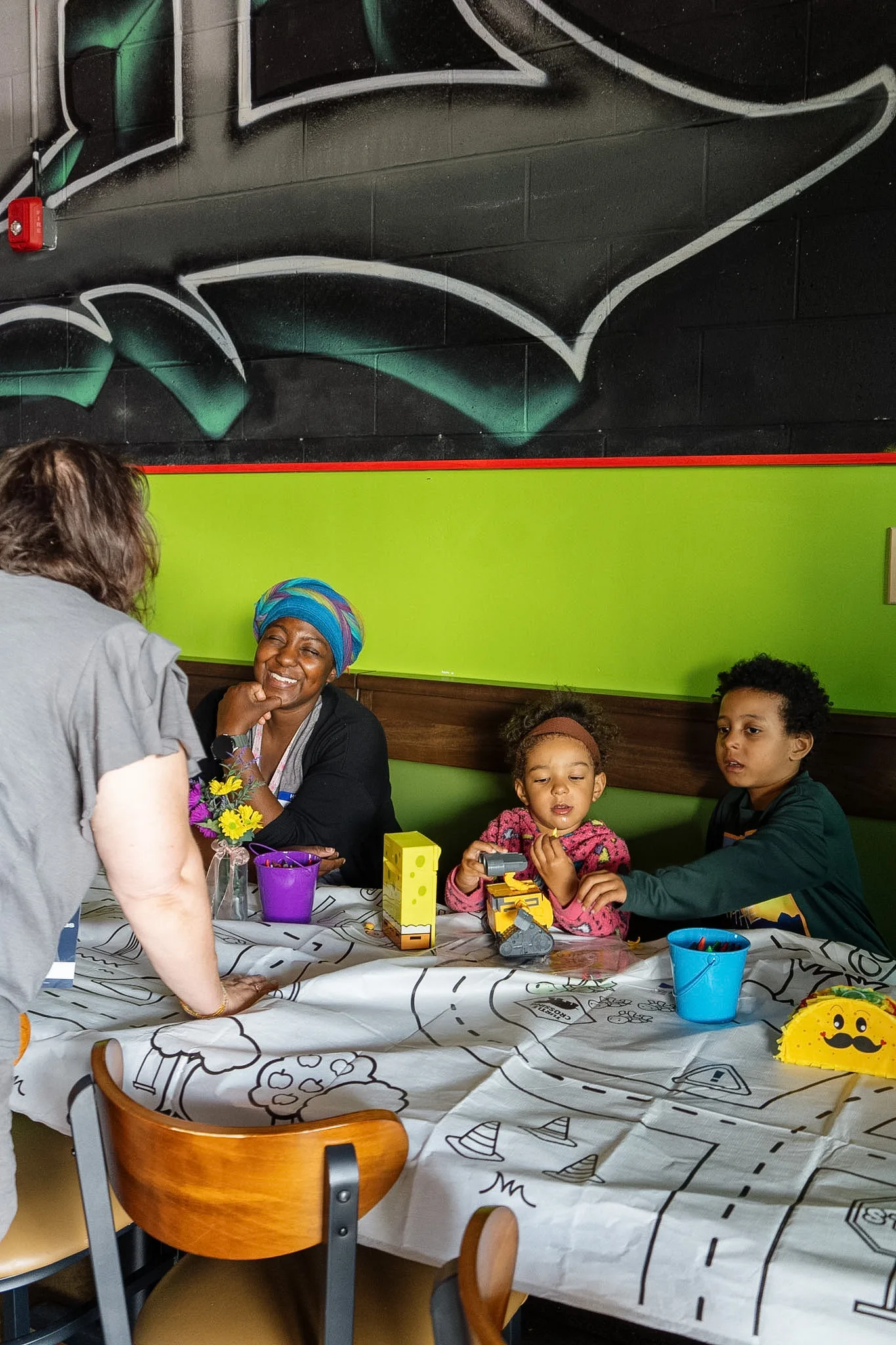 Two students smiling together at a church event